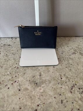 kate spade navy saffiano zip card pouch with gold logo